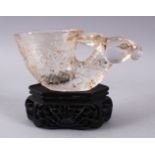A CHINESE CARVED GLASS / CRYSTAL DEER HEAD LIBATION CUP & STAND, the cup carved with the head of a