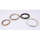 FOUR GOOD MAMLUK CARVED STONE / GLASS BRACELETS. largest 9cm.