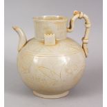 AN UNUSUAL CHINESE DING STYLE POTTERY TEA POT, with incised floral motifs, 15cm high x 14cm wide.
