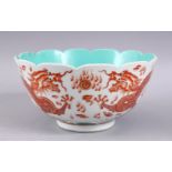A CHINESE IRON RED & TURQUOISE PORCELAIN MOULDED BOWL, with iron red decorated dragons with green