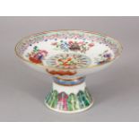 A GOOD CHINESE FAMILLE ROSE PORCELAIN STEM CUP, decorated with bajixing pattern, the underside