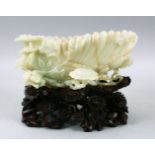 A VERY FINE 19TH CENTURY CHINESE CARVED CELADON JADE CHRYSANTHEMUM FORM BRUSH WASH AND CARVED STAND,