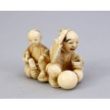 A JAPANESE MEIJI PERIOD CARVED IVORY SMALL OKIMONO - DRINKING MAN, the man drinking saki with his