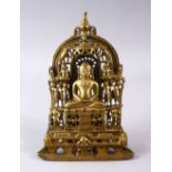 A GOOD SAMVAT 16TH CENTURY WEST INDIAN RAJASTHAN BRONZE AND SILVER INLAID JAIN SHRINE, in a seated