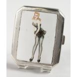 AN ENGINE TURNED SILVER CIGARETTE CASE, with an oval of a glamour model in a black lace dress.