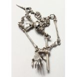 A SILVER SKULL WATCH CHAIN.