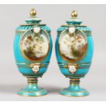 A VERY GOOD PAIR OF 19TH CENTURY SEVRES BLUE VASES AND COVERS, with masks and reverse panels of a