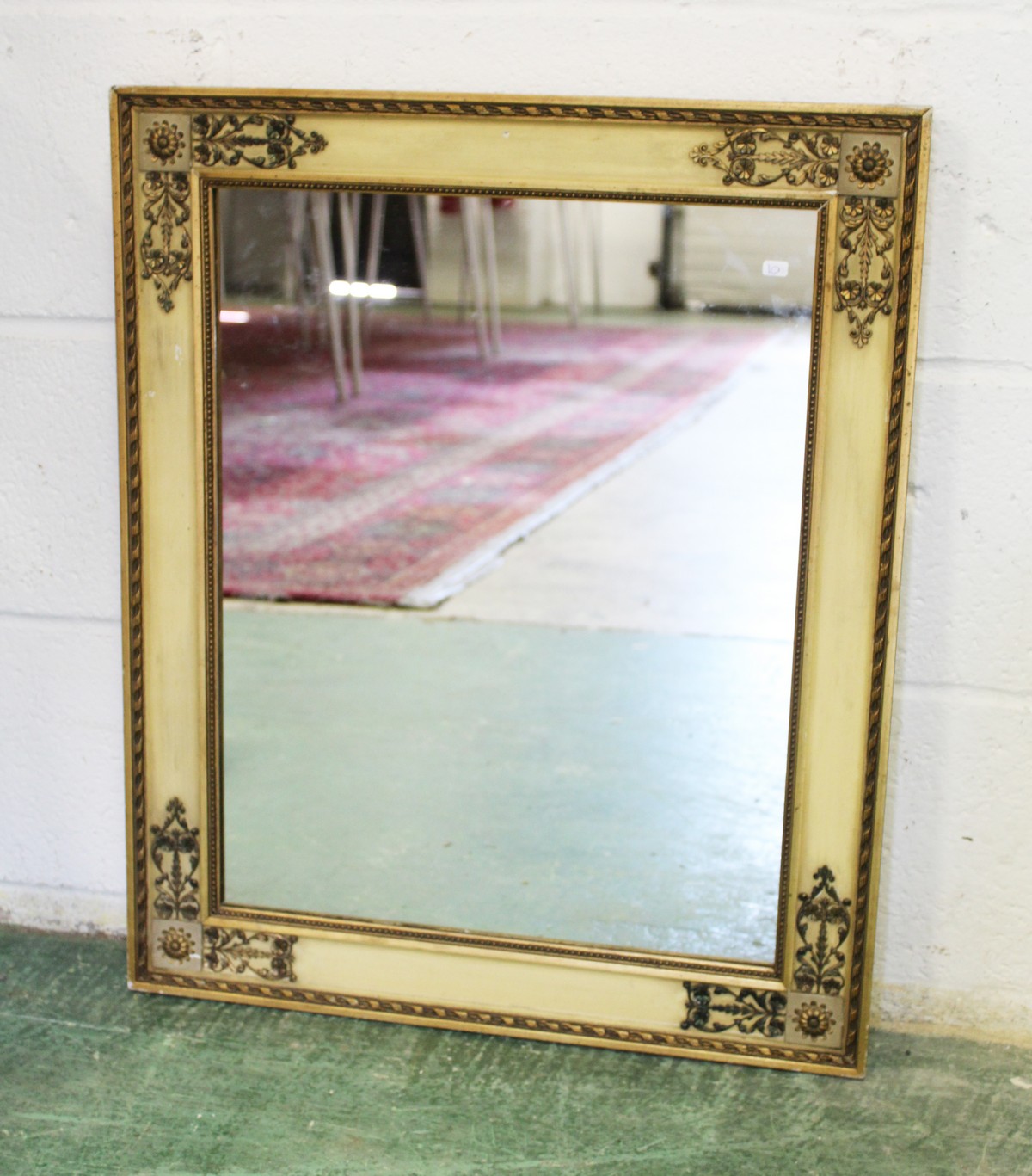 A FRENCH EMPIRE REVIVAL MIRROR, EARLY 20TH CENTURY, with painted and gilt decorated frame. 2ft