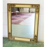 A FRENCH EMPIRE REVIVAL MIRROR, EARLY 20TH CENTURY, with painted and gilt decorated frame. 2ft
