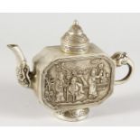 A CHINESE WHITE METAL TEAPOT. 7.5ins long.