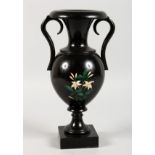 A GOOD 19TH CENTURY ENGLISH INLAID BLACK MARBLE TWO-HANDLED URN. 10ins high.