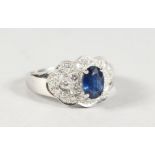 A GOOD 18CT GOLD, DIAMOND AND SAPPHIRE RING.
