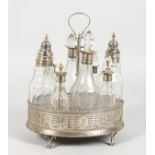 A GEORGE III OVAL PIERCED EIGHT BOTTLE CRUET. London 1779.