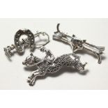 THREE SILVER HORSE BROOCHES.