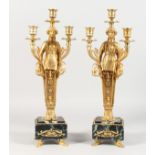 A PAIR OF EMPIRE REVIVAL GILT BRONZE AND MARBLE FIGURAL CANDELABRA. 17ins high.