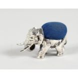 A CAST SILVER ELEPHANT PIN CUSHION.