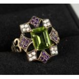 A 9CT GOLD, AMETHYST, PEARL AND PERIDOT RING.