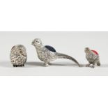 THREE CAST SILVER NOVELTY BIRD PIN CUSHIONS.