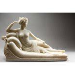 A GOOD 19TH CENTURY ITALIAN WHITE MARBLE SCULPTURE, carved as a reclining female semi-nude, on a