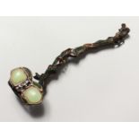 A CHINESE BRONZE AND JADE RUI SCEPTRE. 10.5ins long.