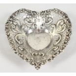 A STERLING SILVER HEART SHAPED PIERCED BONBON DISH. 4.5ins wide.