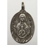 A RUSSIAN SILVER OVAL ICON PENDANT. 2ins high.