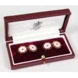 A PAIR OF ASPREY 9CT GOLD, RUBY AND MOTHER-OF-PEARL OCTAGONAL SHAPED CUFFLINKS, in an Asprey leather