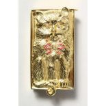 A SILVER AND GOLD PLATED CAT VESTA set with rubies and diamonds.