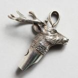 A CAST SILVER STAG NOVELTY WHISTLE.