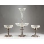 A GOOD GOTHIC DESIGN PLATE CENTREPIECE AND PAIR OF COMPORTS, with etched glass bowls. Centrepiece: