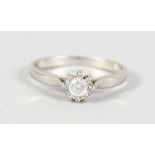 AN 18CT WHITE GOLD SOLITAIRE DIAMOND RING.