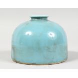 A CHINESE PORCELAIN BLUE GROUND INK POT. 4ins diameter.