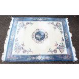 A GOOD LARGE MODERN CHINESE CARPET, beige ground with central floral motif within a similarly