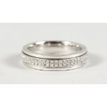 AN 18CT WHITE GOLD AND DIAMOND ETERNITY RING.