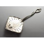 A CONTINENTAL .830 SILVER SKATE FISH LADLE.