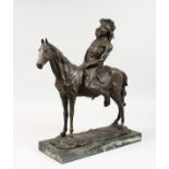 A BRONZE MODEL OF A NATIVE AMERICAN INDIAN ON HORSEBACK, on a marble base. 18ins high.