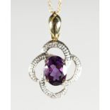 A 9CT GOLD, AMETHYST AND DIAMOND PENDANT on chain.