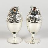 A GOOD PAIR OF SILVER PLATE CHICK EGG CUPS.