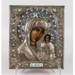 A GOOD RUSSIAN ICON, 20TH CENTURY, painted with the Madonna and Infant Christ, in an elaborate