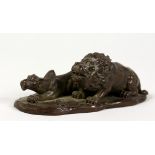 A SMALL JAPANESE BRONZE MODEL OF A LION AND LIONESS. 4ins long.