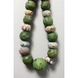 A VERY GOOD SET OF GREEN ROMAN BEADS.