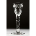 A GEORGIAN WINE GLASS with engraved bowl and cut stem, foot rim re-attached. 5.75ins high.