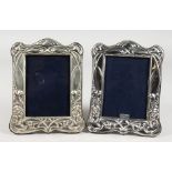 A PAIR OF ART NOUVEAU STYLE PHOTOGRAPH FRAMES. 8ins x 6.25ins.