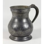 A LARGE EARLY PEWTER HALF GALLON MEASURE, stamped Gallon. 7.5ins high.