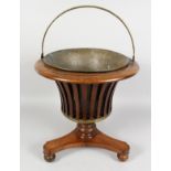 A DUTCH MAHOGANY JARDINIERE WITH BRASS LINER. 17ins high.