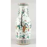 A 19TH CENTURY PORCELAIN VASE, painted with figures in a landscape. 23ins high.