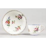 A SEVRES COFFEE CUP AND SAUCER, painted flowers under a blue line border, interlaced L's in blue,