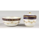 A CAUGHLEY SUCRIER AND COVER, and matching bowl, both decorated in blue and gilt, blue 'S' mark to