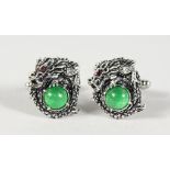 A PAIR OF SILVER AND JADE DRAGON CUFFLINKS.