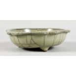 A CHINESE CRACKLE GLAZE CELADON BRUSH WASHER. 6ins diameter.